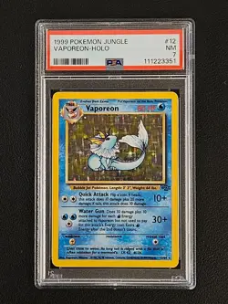 Vaporeon 12/64 Holo Rare Pokemon 1999 WOTC Jungle Set PSA 7 - Image 1