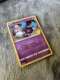 Pokemon TCG Cosmog Celebrations Holo Rare Card 013/025 NM Condition - Image 1