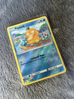 Pokemon TCG Psyduck 2017 Sun & Moon Reverse Holo Card 28/149 - Image 1