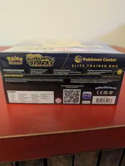 Pokemon TCG Surging Sparks ETB Pokemon Center Exclusive - New Factory Sealed - Image 2