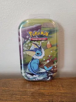 Pokemon Prismatic Evolutions Mini Tin Factory Sealed - Vaporeon - Image 1