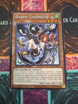 Yugioh Harpie Channeler SBC2-ENH04 Prismatic Secret Rare 1st Edition NM/LP - Image 1