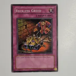 Yugioh TCG- Reckless Greed - SD2-EN027 - NM - Common - 1st Edition - Trap - 2004 - Image 1