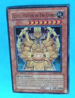 YUGIOH EXXOD, MASTER OF THE GUARD SD7-EN001 1ST ED ULTRA RARE VERY LIGHT PLAY - Image 1