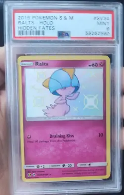 2019 Pokemon S & M Hidden Fates #SV34 Ralts - Holo PSA 9 MINT - Image 1