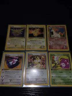 Pokemon Bulk LP/MP w/ 2 holos and 1st edition team rocket, gym heros and fossil - Image 2