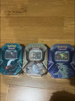 Pokemon TCG Triple Whammy Sealed Tins ( Complete Set) - Image 1
