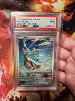 2024 POKEMON SSP EN-SURGING SPARKS ILLUSTRATION RARE #209 SKARMORY PSA 9 - Image 1