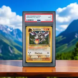 1999 Pokemon Fossil Aerodactyl Holo #1 PSA 9 Graded TCG Card - Image 1