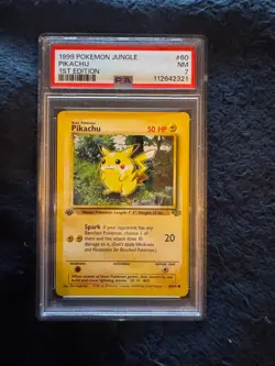 PSA 7 Near Mint Pikachu 1st Edition #60 - 1999 Pokemon Jungle - Image 1