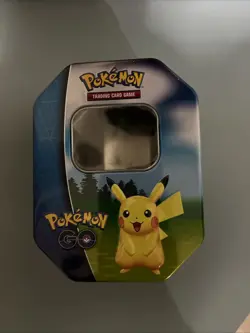 Empty Pokemon Go trading card tin featuring Pikachu, Snorlax & Blissey - Image 1