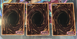 YuGiOh PLAYSET Summoned Skull SBC1-ENI01 3x Secret Rare 1st Edition - Image 2