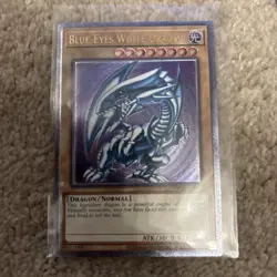 Yugioh OP28-EN001 Blue-Eyes White Dragon Ultimate Euro deep imprint purple hue - Image 1