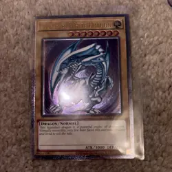 Yugioh OP28-EN001 Blue-Eyes White Dragon Ultimate Euro deep imprint purple hue - Image 2