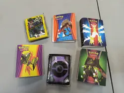Pokemon TCG Card protectors + Lot of Tiny Binders - Image 1