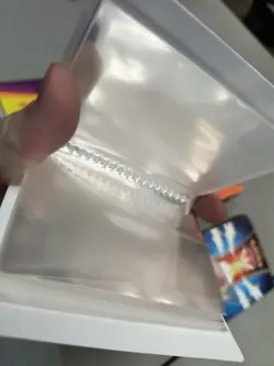 Pokemon TCG Card protectors + Lot of Tiny Binders - Image 5