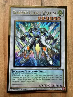 YUGIOH Stardust Charge Warrior - MAGO-EN029 - Premium Gold Rare 1st Edition CARD - Image 1