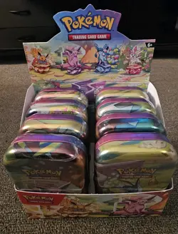 Pokemon TCG Prismatic Evolutions Mini Tin Display - Full Set of 8 Sealed Tins - Image 1