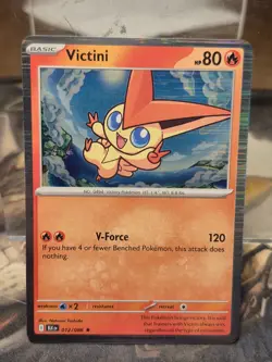 Pokemon TCG Victini NM Reverse Holo Rare 012/086 Black Bolt Card Scarlet Violet - Image 1