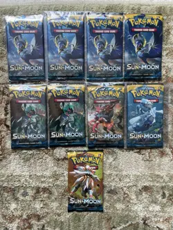 2017 Pokemon TCG Sun and Moon Base Set Booster Packs Lot Of 9 Factory Sealed - Image 1