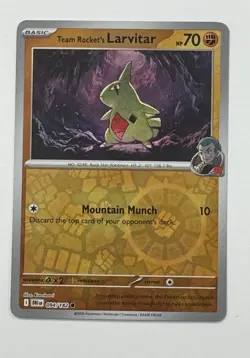 Pokemon TCG Team Rocket’s Larvitar 094/182 Destined Rivals Reverse Holo NM Card - Image 1