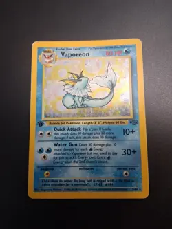 Vaporeon 12/64 1st Edition Holofoil Jungle Pokemon MP Fast Ship - Image 1