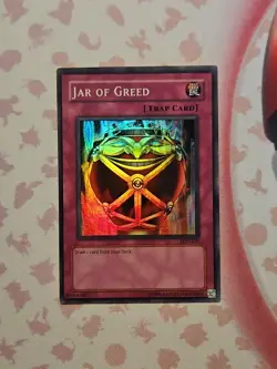 Yugioh TCG Jar of Greed LON-047 2003 Unlimited Super Rare Moderately Played - Image 1