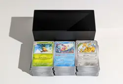 Pokemon Card Bulk Surging Sparks Pokemon TCG (Regular Finish) 550+ Cards - Image 1