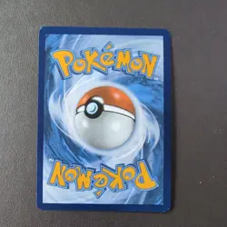 Treasure Tracker 131/131 Holo Pokemon TCG Card Prismatic Evolutions - Image 2