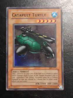 Yu-Gi-Oh! SUPER RARE HOLO CARD CATAPULT TURTLE MRD-075 1996 VINTAGE PRINT MP - Image 1