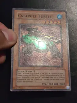 Yu-Gi-Oh! SUPER RARE HOLO CARD CATAPULT TURTLE MRD-075 1996 VINTAGE PRINT MP - Image 2