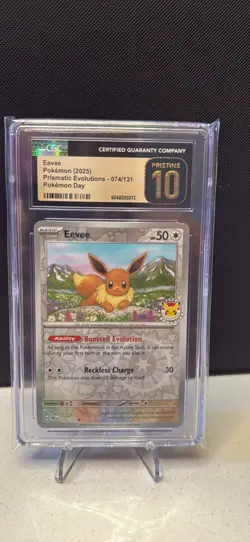 2025 POKEMON PRISMATIC EVOLUTIONS, POKEMON DAY #074/131 EEVEE CGC 10 PRISTINE - Image 1