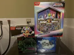 Pokemon Center Lot 2x Sealed ETBs 1X Prismatic Binder & Prismatic Surprise Box - Image 2