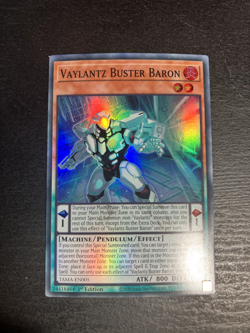 Yugioh VAYLANTZ BUSTER BARON - TAMA-EN005 - NM - 1ST EDITION - SUPER RARE - Image 1