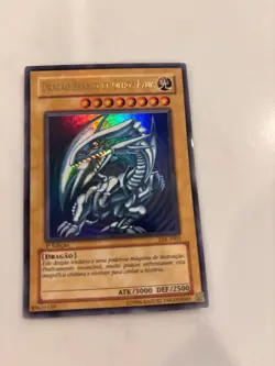 yugioh card portugese 1st edition foil blue eyes White Dragon DIK-P001 - Image 1