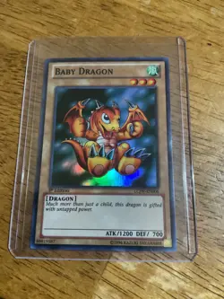 🔥 YUGIOH TCG Baby Dragon LCJW-EN006 SUPER RARE HOLOFOIL NM 1ST EDITION - Image 1