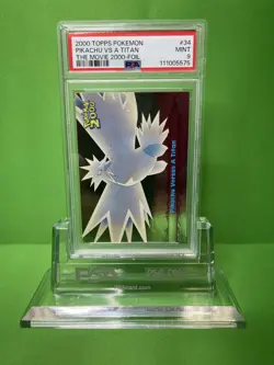 2000 TOPPS POKEMON THE MOVIE 2000 34 PIKACHU VERSUS A TITAN FOIL PSA 9 - Image 1