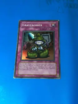 YUGIOH Super Rare Graverobber PSV-008 PLAYED - Image 1