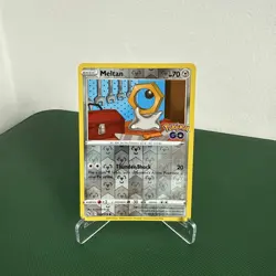 045/078 MELTAN REVERSE HOLO POKEMON GO POKEMON CARD - Image 1