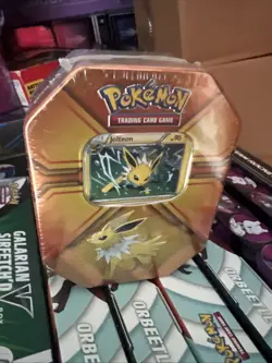 Jolteon Sealed Tin Pokemon Center Trading Cards TCG Game Triple Effect rip back 820650102851 - Image 1