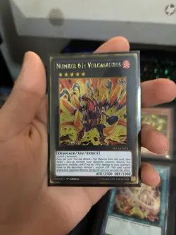 YUGIOH TCG NUMBER 61: VOLCASAURUS PGL3-EN073 GOLD 1ST EDITION - Image 1