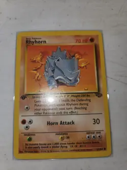 Rhyhorn 61/64 - 1st Edition Jungle Pokemon Card - Vintage WOTC 1999 - NM/LP - Image 1