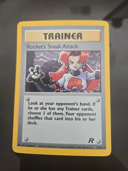 1995 Pokemon Rockets Sneak Attack Trainer Holo Card - Image 1
