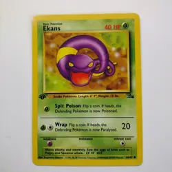 1st Edition Ekans 46/62 Regular Fossil Pokemon Card LP - Image 1