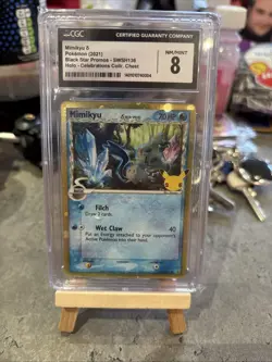 CGC 8 Mimikyu SWSH136 Delta Species Celebrations Promo Black Star Pokemon Card - Image 1
