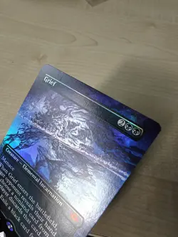 MTG Misprint Grief Borderless Foil Ink Strap across the card - Image 3