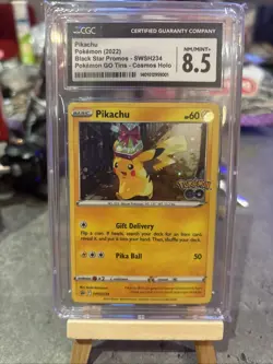 CGC Graded 8.5 Pikachu SWSH234 Black Star Promo Cosmos Holo Pokemon Card - Image 1