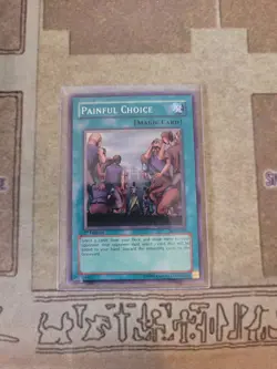 YUGIOH PAINFUL CHOICE MRL-049 SUPER 1ST ED LP 1996 - Image 1