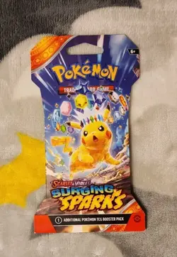 Pokemon Surging Sparks Booster Pack 10 Cards SEALED - Image 1