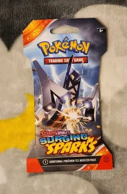 Pokemon Surging Sparks Booster Pack 10 Cards SEALED - Image 1